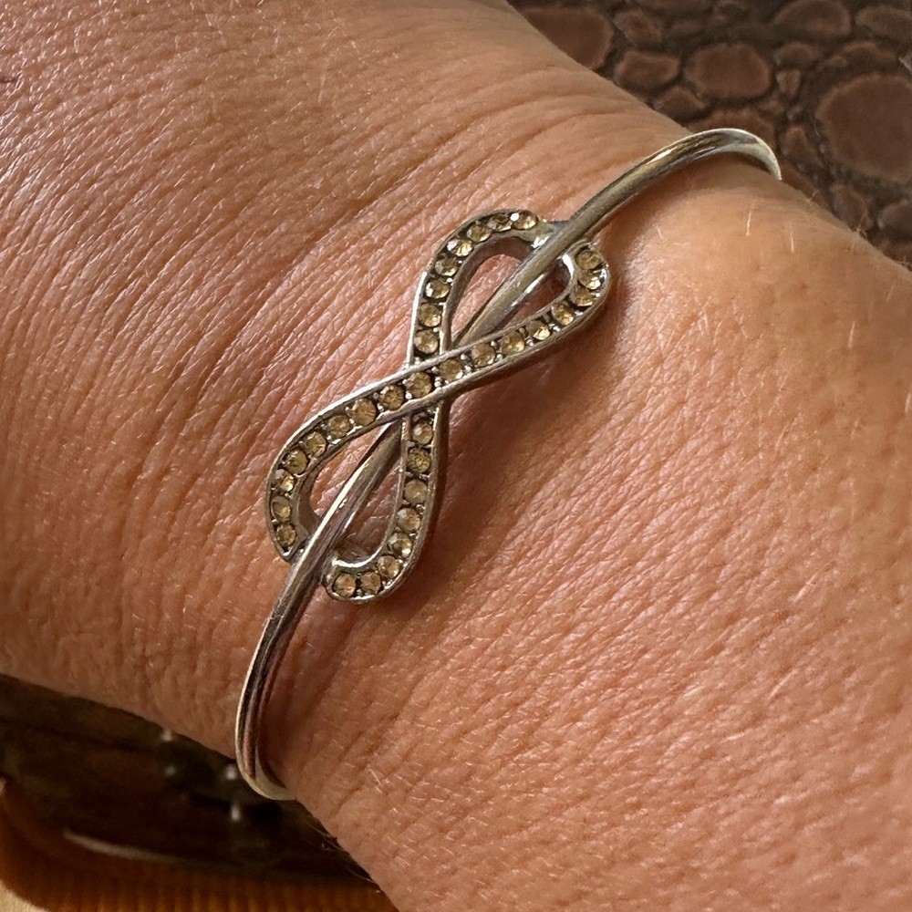 Silver Tone Metal w/ Champagne Colored Crystals Infinity Cuff Bracelet.